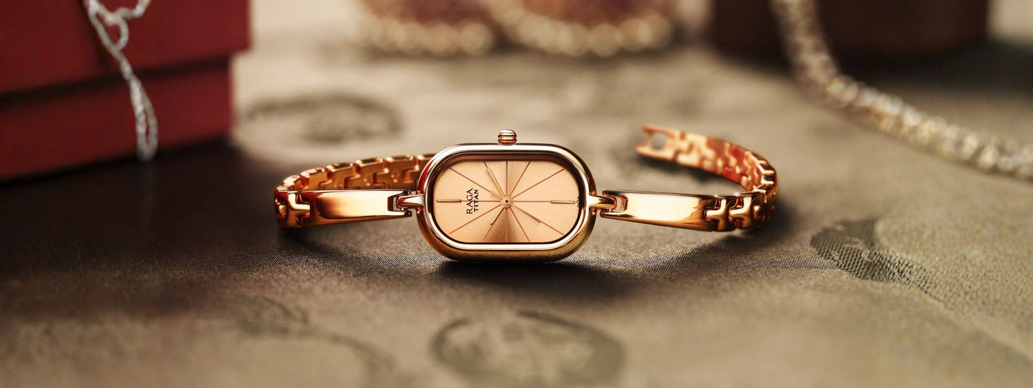 Elegant Titan Raga women’s gold wristwatch displayed on a luxury background – shop premium Titan women’s watches at Peroz Australia.