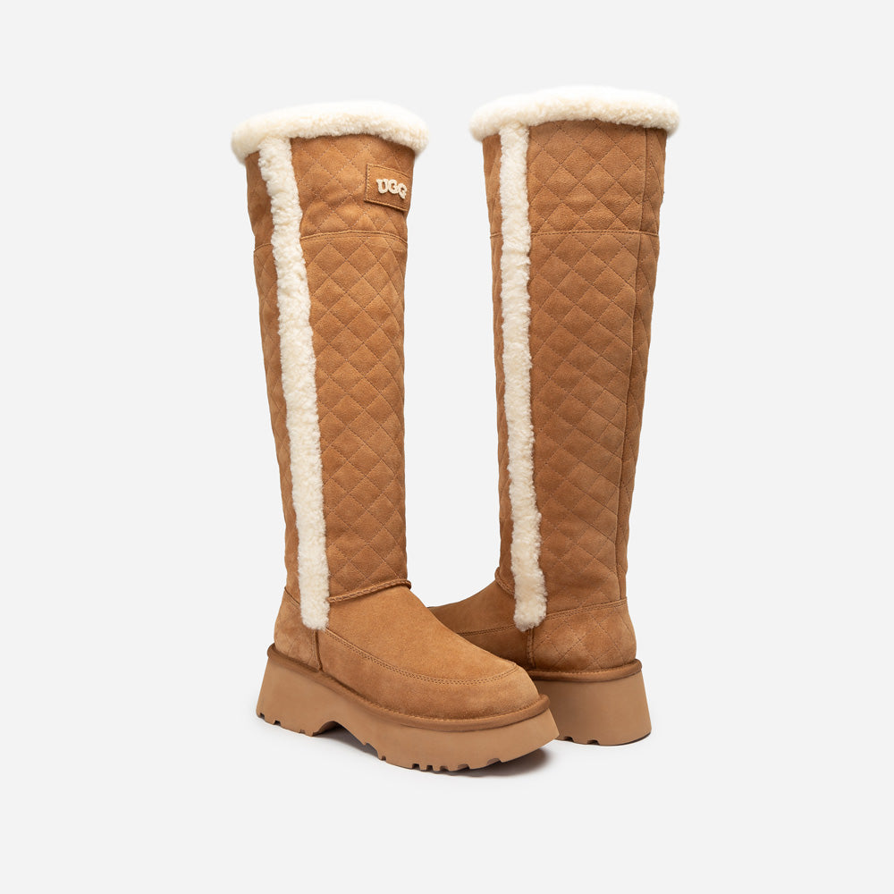Pair of tan knee-high UGG boots with white fur lining on a light gray background